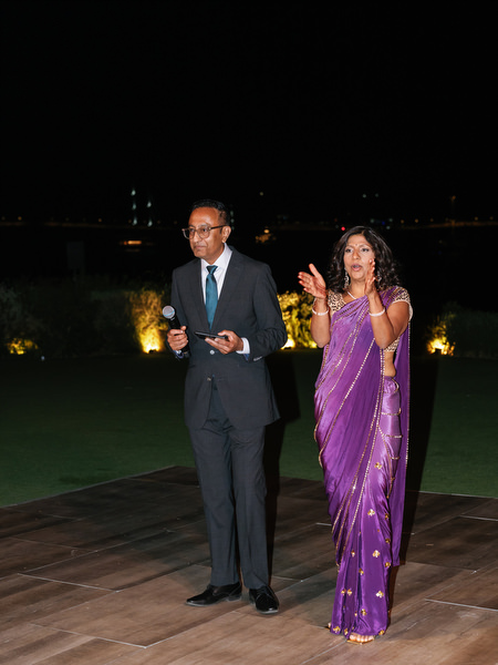 Guests speaking on dance floor at night at Island Resort the Residence Athens