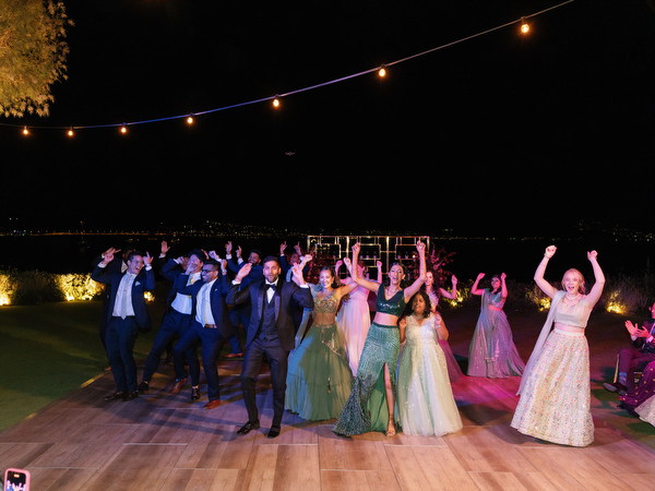 Group dance choreography under string lights at Island Resort the Residence