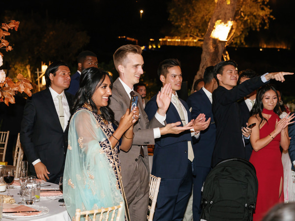 Guests cheering from reception tables at Island Resort the Residence