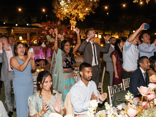 Guests applauding and celebrating during night reception at Island Resort the Residence