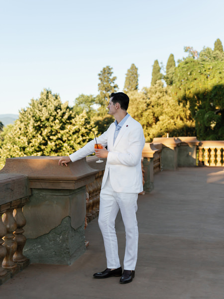 Groom enjoying Florence skyline view during pre-wedding event