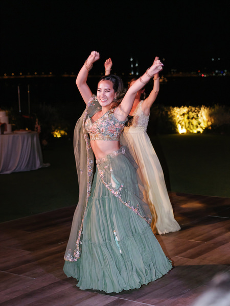 Women dancing on wooden dance floor at Island Resort the Residence overlooking the Athens Riviera