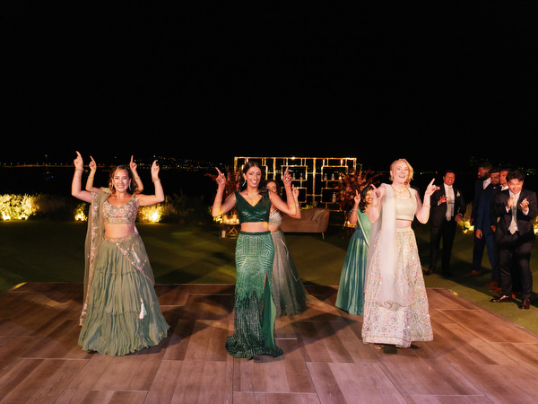 Group dance performance on Athens Riviera lawn at Island Resort the Residence