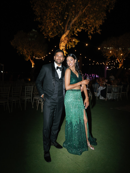 Couple posing at night under fairy lights at Island Resort the Residence