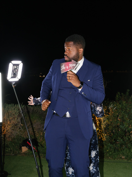 Guest using photo booth setup at Island Resort the Residence Athens Riviera reception