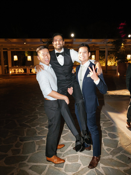 Friends posing together on stone terrace at Island Resort the Residence Athens Riviera