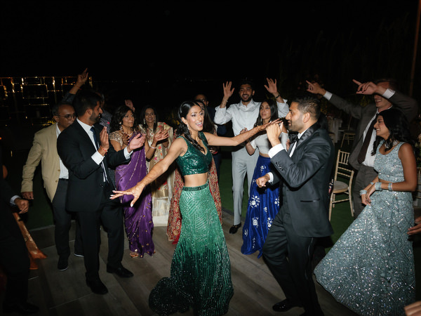Bride dancing surrounded by guests at Island Resort the Residence Athens Riviera