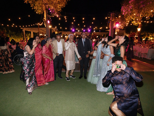 Guests raising glasses in celebration at Island Resort the Residence