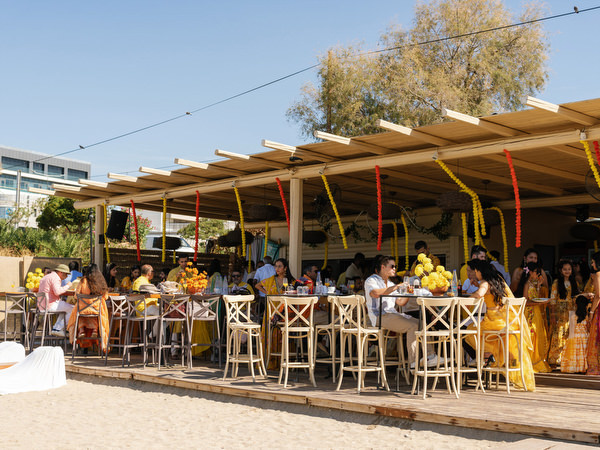 Beach bar setup during Haldi ceremony on Athenian Riviera