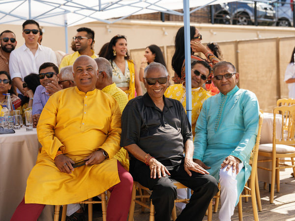 Family members attending Haldi ceremony celebration