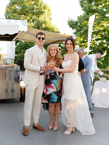 Bride and groom applauding guests during Florence welcome celebration