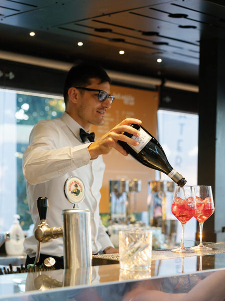 Bartender preparing cocktails during Florence welcome party