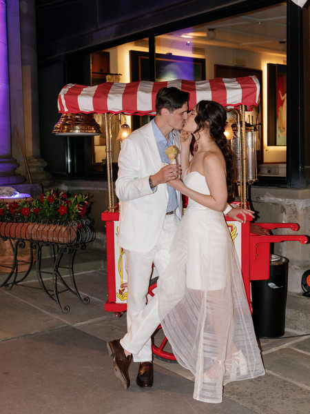 Couple walking past gelato cart during Florence pre-wedding party