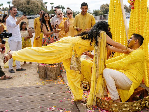 Groom covered in turmeric during Haldi ceremony