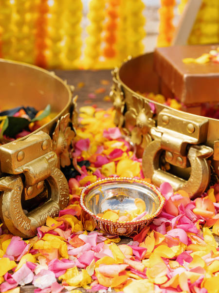 Haldi ceremony bowls with turmeric and flowers