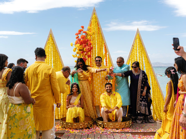 Guests celebrating Haldi ceremony on the beach