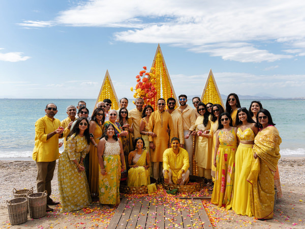 Group portrait during Haldi ceremony at Rubirosa