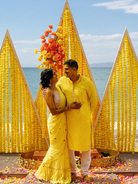 Couple embracing after Haldi ceremony ritual
