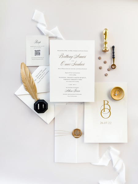 Black and gold wedding invitation at Island Resort Athens Riviera