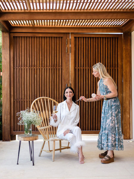 Bridal makeup preparation at Athens Riviera wedding.