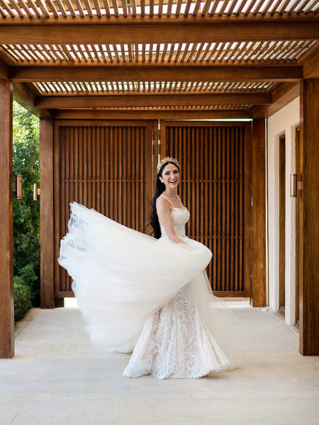 Bride twirling Private House Island Resort Athens Riviera wedding.