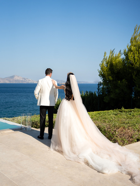 Bride and groom first look at Athens Riviera Private House.