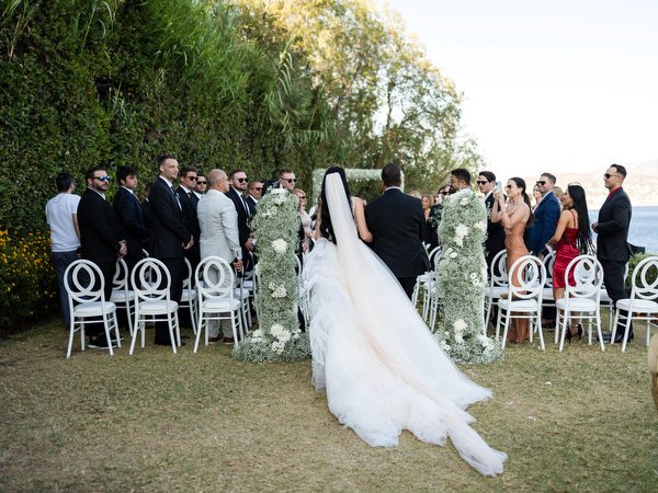 Bride entrance at Island Resort Athens Riviera seaside ceremony.