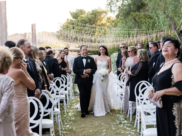 Bride entrance at Private House Island Resort Athens Riviera seaside ceremony.