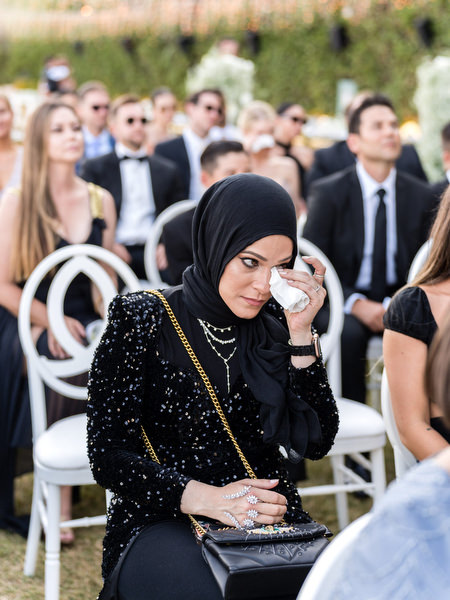 Emotional guest at Athens destination wedding.