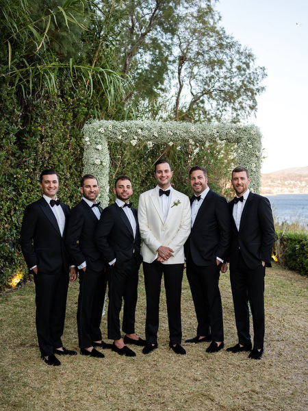 Groom and groomsmen portrait at at Private House Island Resort Athens Riviera Athens.