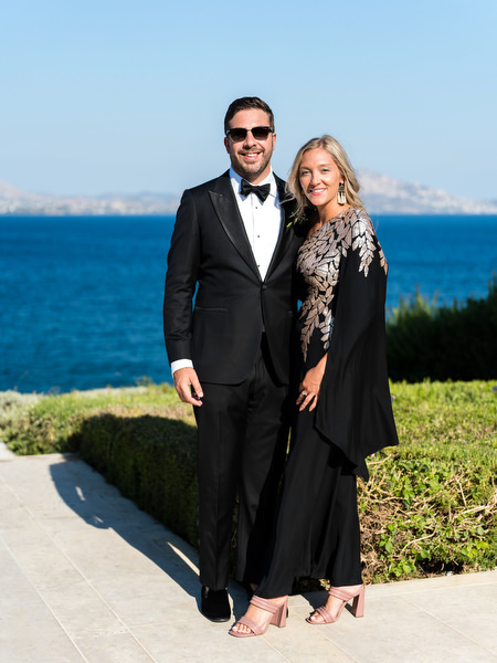Black tie guests at Island Resort Athens Riviera wedding.