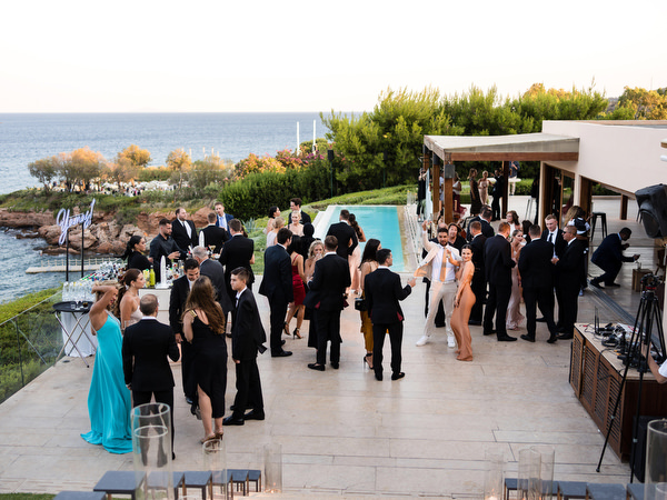 Island Resort Athens Riviera cocktail hour atmosphere.