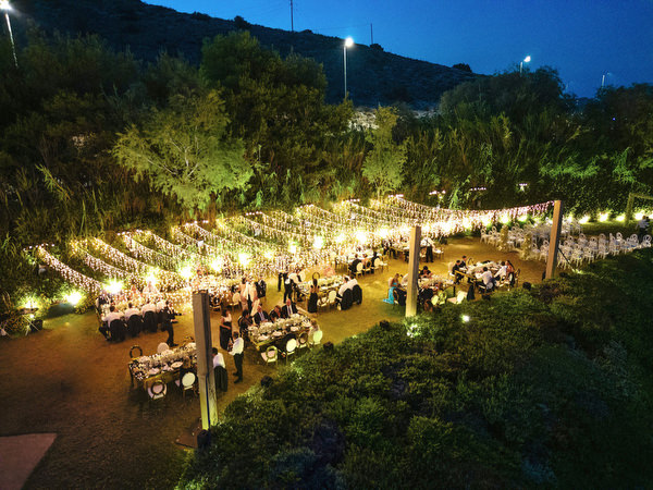 Athens Riviera outdoor wedding reception at night.