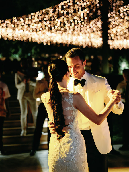 Luxury Athens wedding first dance under fairy lights.