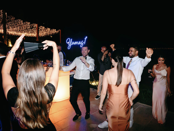 Black tie Athens Riviera wedding party at night.
