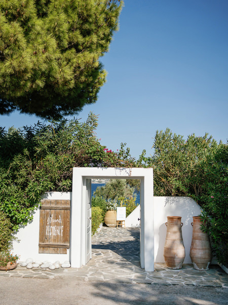 Traditional white entrance at Residence Island Resort, iconic Athens Riviera wedding venue in Greece.