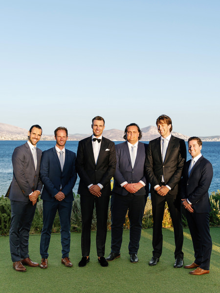 Groomsmen portrait at Island Resort overlooking the Aegean Sea, elegant Athens Riviera wedding.