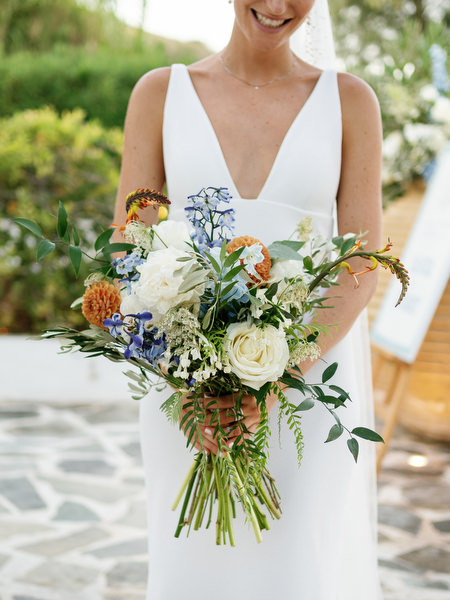 Bridal bouquet with blue and white blooms at Island Resort, luxury Athens Riviera wedding in Greece.