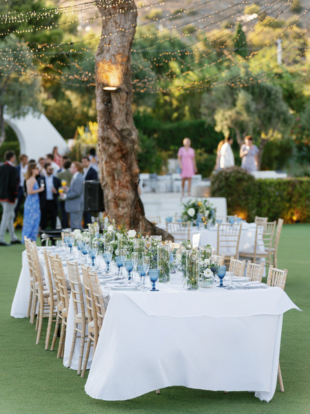 Elegant reception table setup at Island Resort, luxury Athens Riviera wedding reception by the sea.