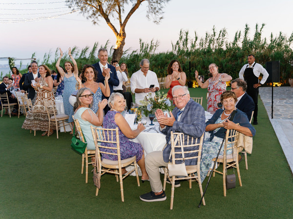 Evening wedding reception at Island Resort overlooking the Aegean Sea, Athens Riviera venue.