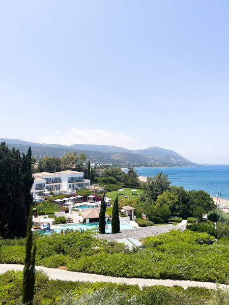 Aerial coastal view of Anassa Hotel in Cyprus overlooking the Mediterranean Sea.
