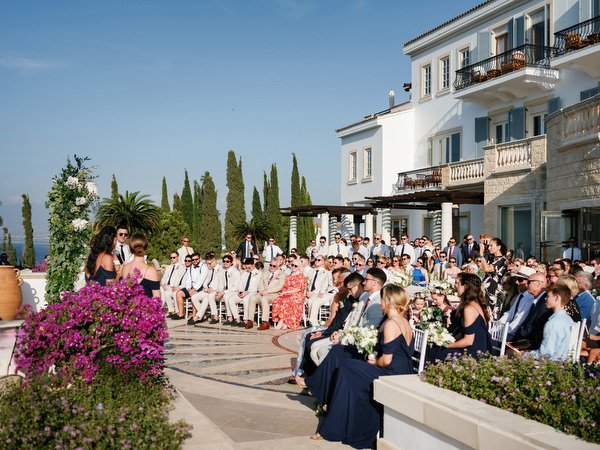 Outdoor sea view wedding ceremony at Anassa Hotel luxury resort in Cyprus.