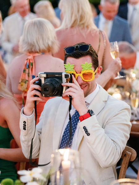 Guest photographing reception at Anassa Hotel Cyprus wedding.