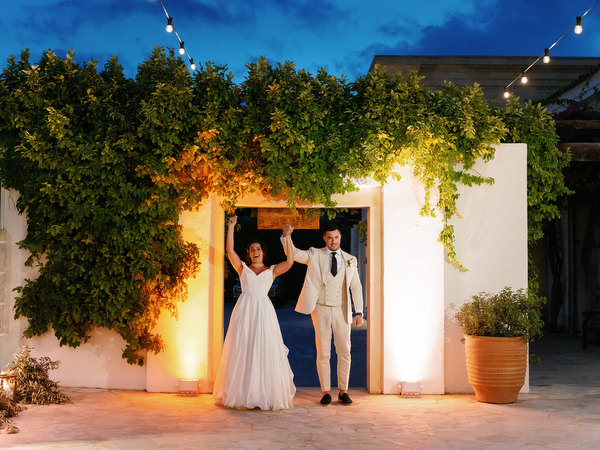 Bride and groom reception entrance at night at Anassa Hotel Cyprus wedding.