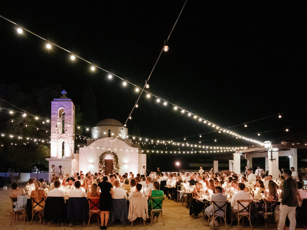 Night reception at Anassa Hotel Cyprus with chapel and string lights.