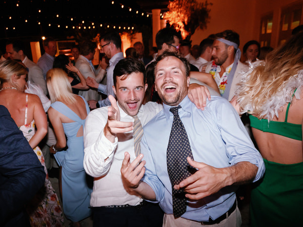 Wedding guests celebrating at Anassa Hotel Cyprus night reception.