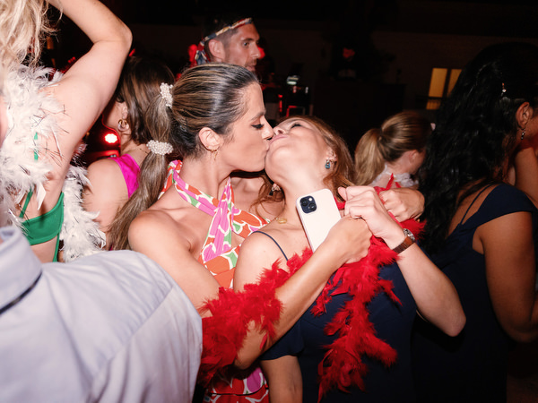 Guests dancing together during Cyprus destination wedding party.