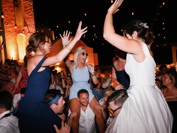 Bride lifted during dancefloor celebration at Anassa Hotel Cyprus.