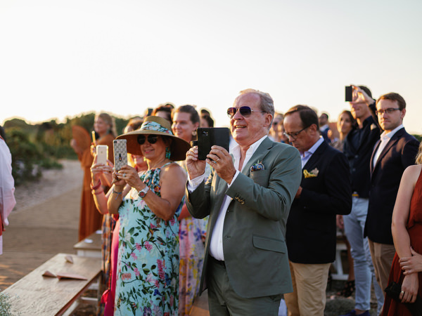 Guests seated during sunset ceremony in Antiparos, Greece.