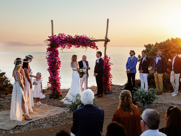 Cliffside wedding ceremony in Antiparos overlooking the Aegean Sea.